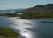 San Luis Reservoir shines in the mid-day sun
