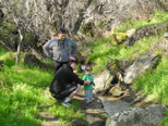 Jack at a creek with Uncle Mike and Lizzie