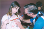 34 Dan Kramer, famous Atarian, autographs his T-Shirt to Jeri