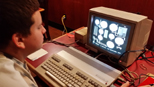 Vincent trying out a new Commodore game