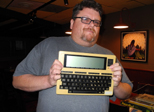 Louis proudly shows off his "new" Tandy 102 laptop
