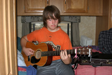 Practicing guitar in 2012 at age 15