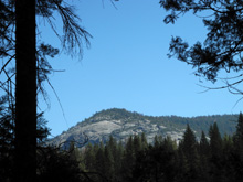 Wawona Dome stands guard above the little valley